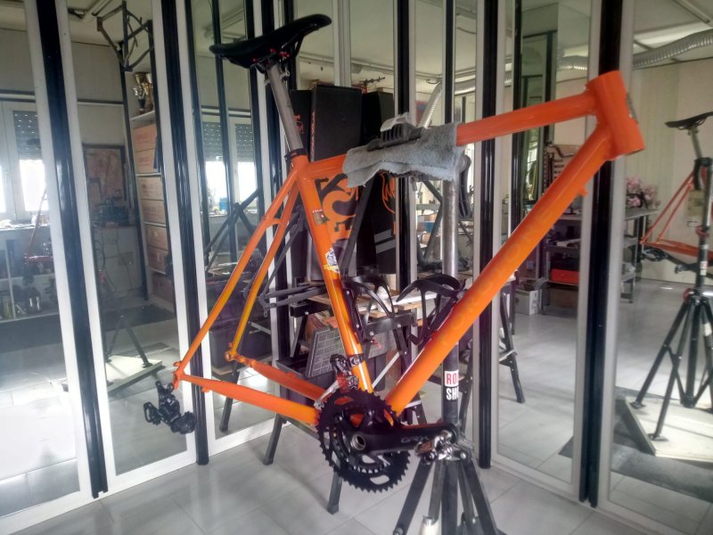 Orange plus Gravel bicycle frame in steel, silver fillet brazed technique, numbered frame